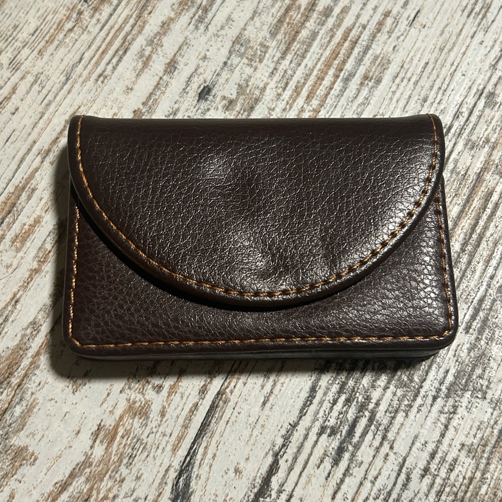 Brown Ocadux Leather Business Card Holder is a compact, pocket-sized wallet